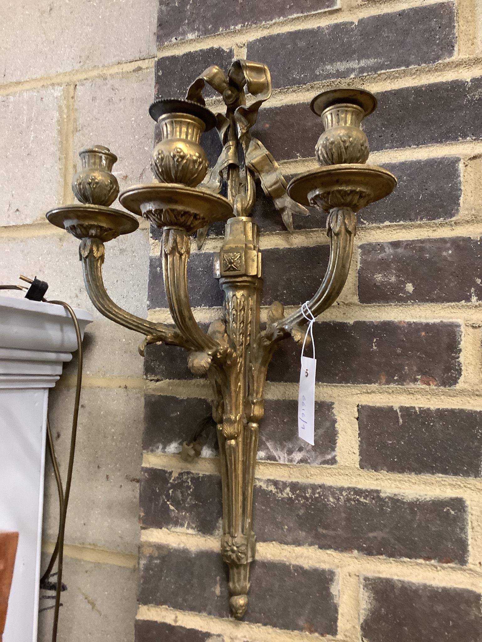 A gilt metal three branch wall light (converted), height 53cm